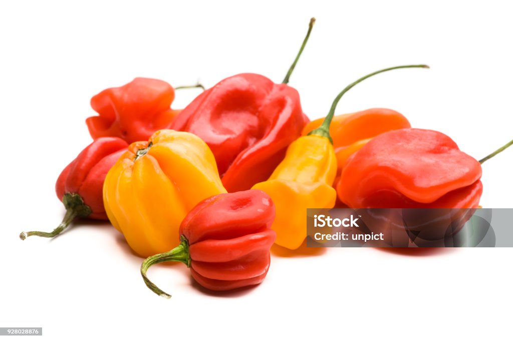 Several habanero chilis on a pile real edible vegetable - no artificial ingredients used Habanero Stock Photo