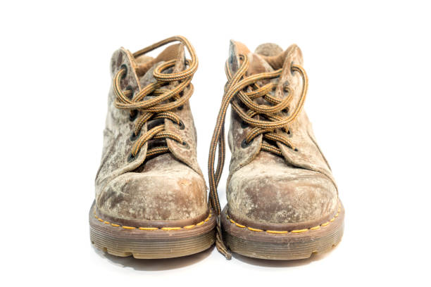 istock Moldy old leather shoes on white background 928031954