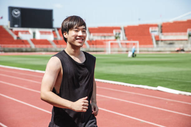 istock Young Asian man doing exercise in the summer 928036828