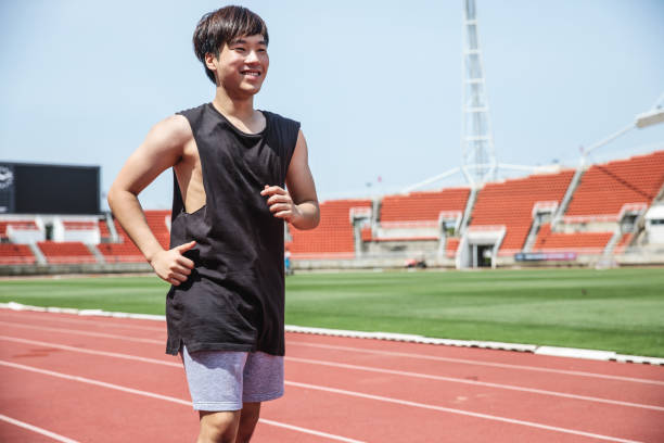 istock Young Asian man doing exercise in the summer 928036880