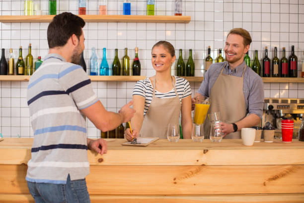 istock Positive young woman taking an order 928037172