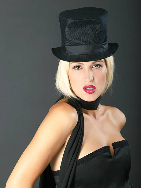 istock Blonde woman in black hat. 92803817