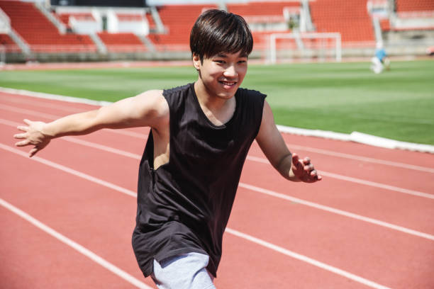 istock Young Asian man doing exercise in the summer 928039390