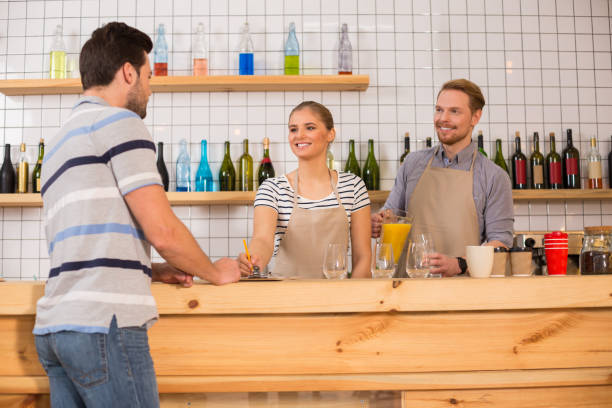 istock Joyful young people working in the cafeteria 928039864