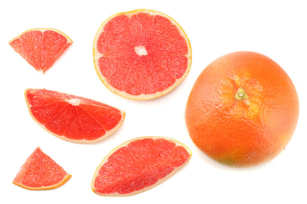 istock healthy food. sliced grapefruit isolated on white background top view 928043468