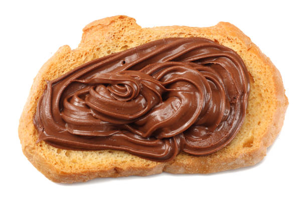istock Slice of bread with chocolate cream isolated on white background 928043512