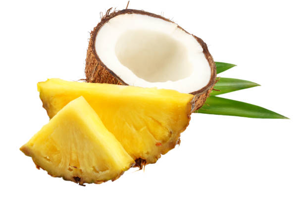 istock Coconut with pineapple slices and green leaves isolated on white background 928043522