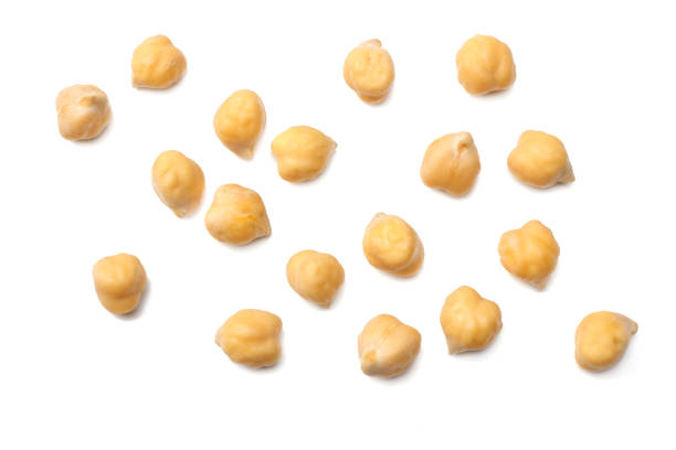 istock chickpeas isolated on white background. top view 928043560