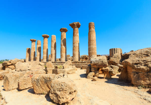 Ruined Temple of Heracles columns in famous ancient Valley of Temples, Agrigento, Sicily, Italy. UNESCO World Heritage Site.