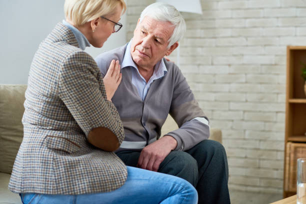 istock Senior Man Talking to Psychologist 928044320