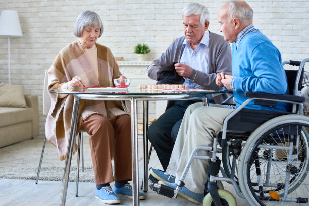 istock Senior Friends Playing Lotto 928044362