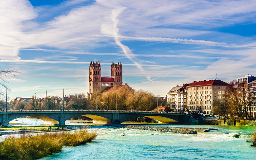 Winter landscape by St. Maximilian church and Isar in Munich