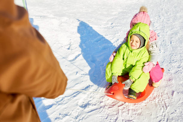 istock Little kids on sled ride 928047226
