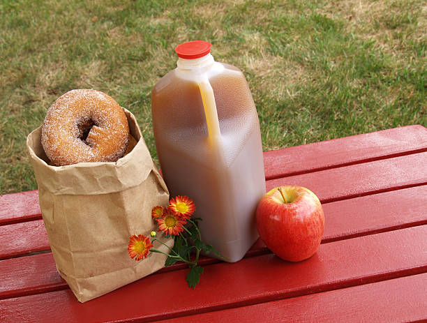 apple cider and donuts stock photo