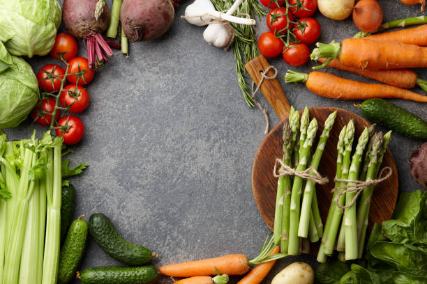 istock Fresh raw asparagus and other spring vegetables 928057484