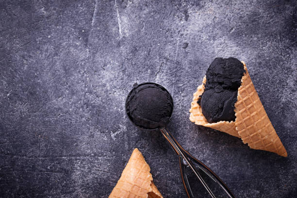 istock Black ice cream. Trendy food 928059020