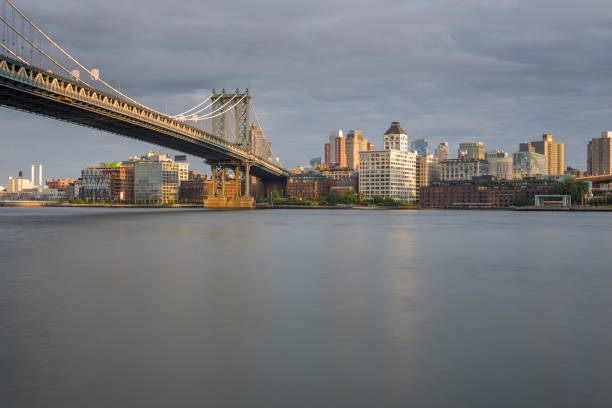 istock Sunset view of Manhattan Bridge, New York 928059096