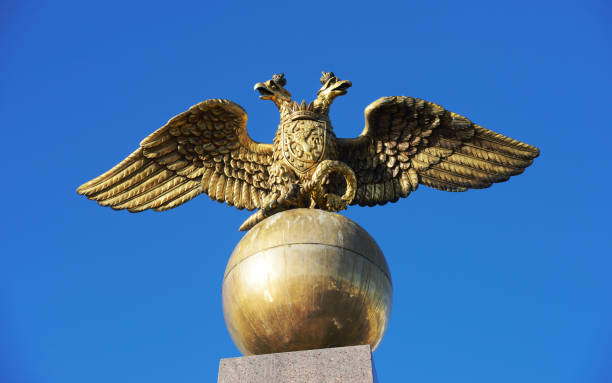 istock Two headed golden eagle obelisk in the market square Helsinki Finland 928062024