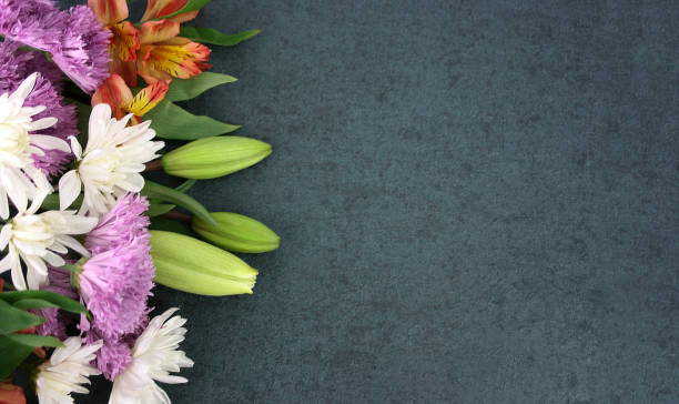istock Beautiful Spring Flowers Over Blackboard Background 928066178