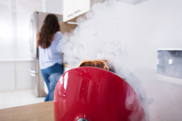istock Smoke Emitting Through Burnt Toast Coming Out From Toaster 928066204
