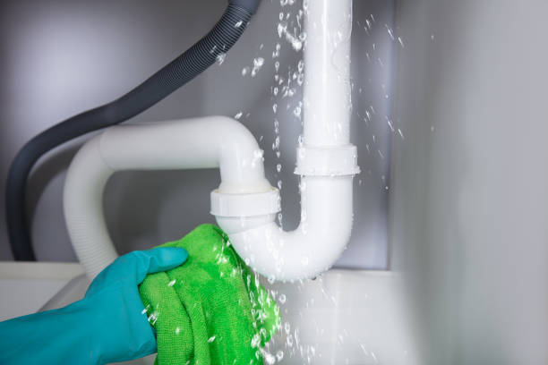 istock Woman Holding Napkin Under Sink Pipe Leakage 928066308