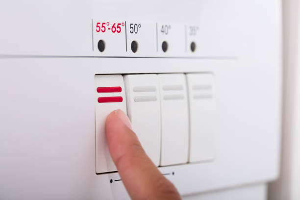 istock Person Hands Pressing Button Of Dishwasher 928068960