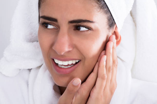 istock Young Woman Holding Toothache 928069608
