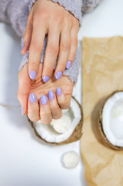 istock Purple female manicure 928069778