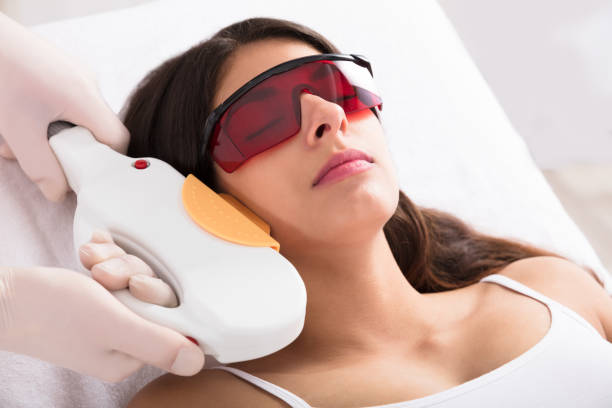 istock Laser Epilation Treatment On Woman's Chin 928070018
