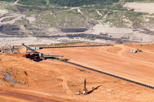 istock Part of a pit with big mining truck working 928070680