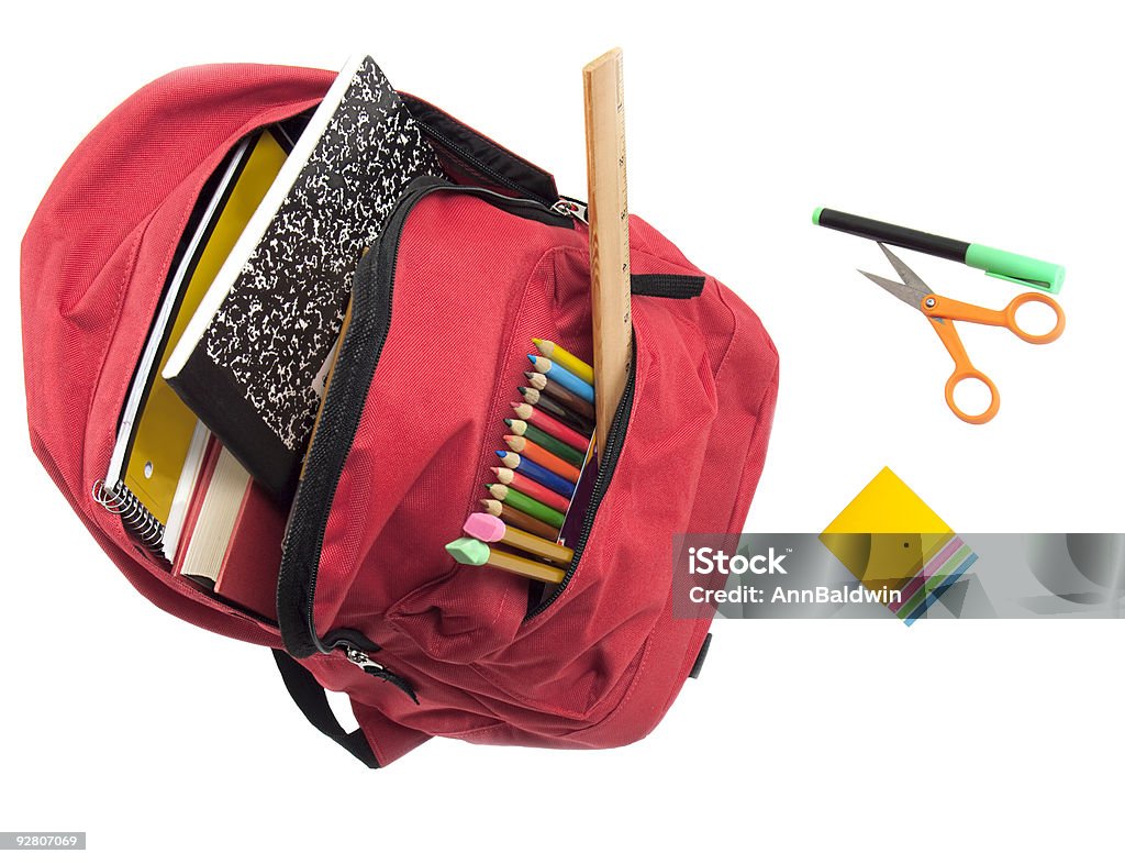 Red mochila recheado com material escolar - Foto de stock de Mochila - Bolsa royalty-free
