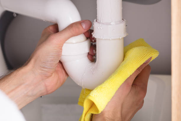 istock Person Holding Napkin Under Sink Pipe Leakage 928076818