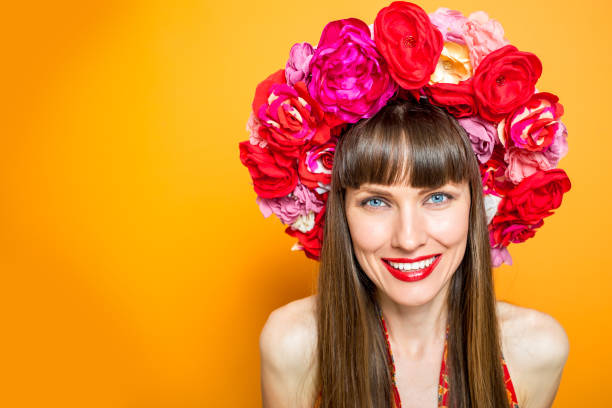 istock Summer beauitful woman with floral hat 928077162