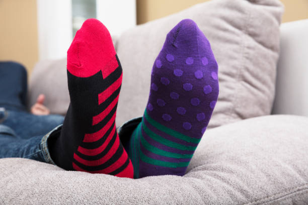 istock Close-up Of A Human Feet With Socks 928081256