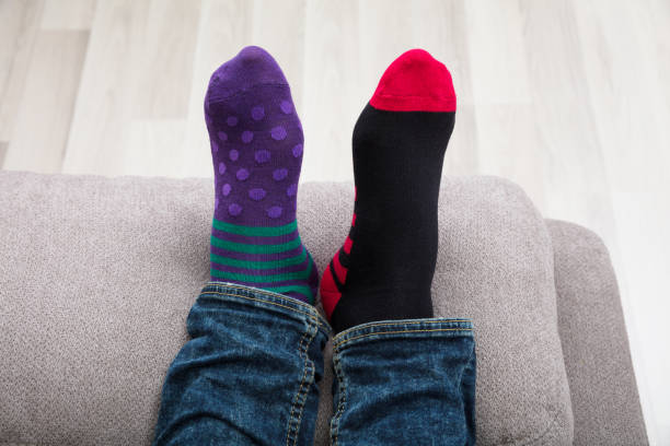 istock Close-up Of A Human Feet With Socks 928081262