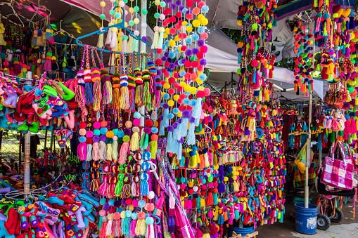 Pom-poms are sold at a street market stall in Sayulita, Mexico. Shot with Canon 5D Mark lV.