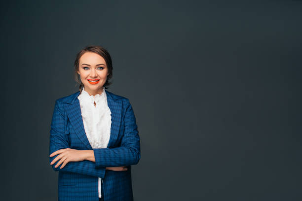 istock Portrait confident business woman on gray 928084996