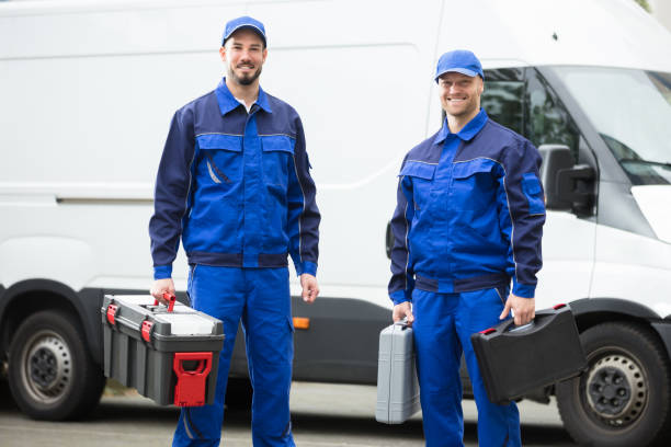 happy male workers holding toolboxes - empreiteiro de reparações imagens e fotografias de stock