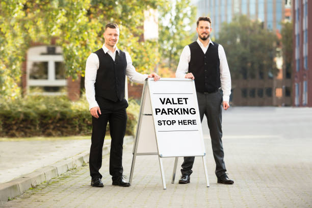 portrait of a young male valet - valet parking imagens e fotografias de stock