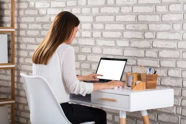 istock Young Businesswoman Using Laptop 928088412