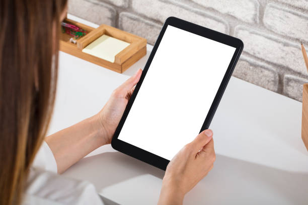 istock Close-up Of A Person Using Digital Tablet 928088428