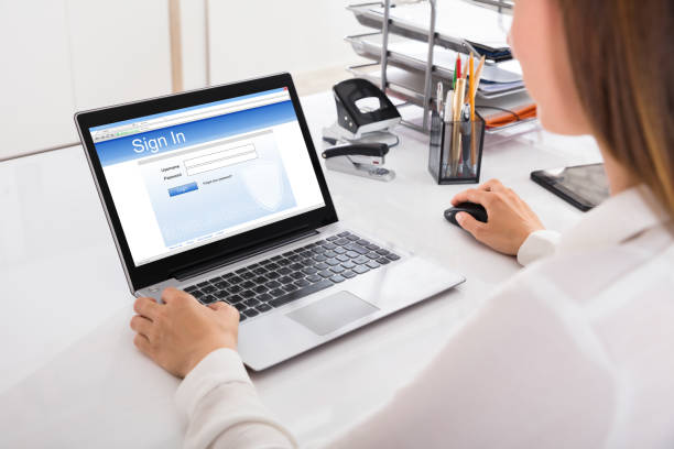 istock Businesswoman Signing Into A Website On Computer 928088830