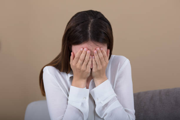 istock Tensed Woman Covering Her Face 928089170