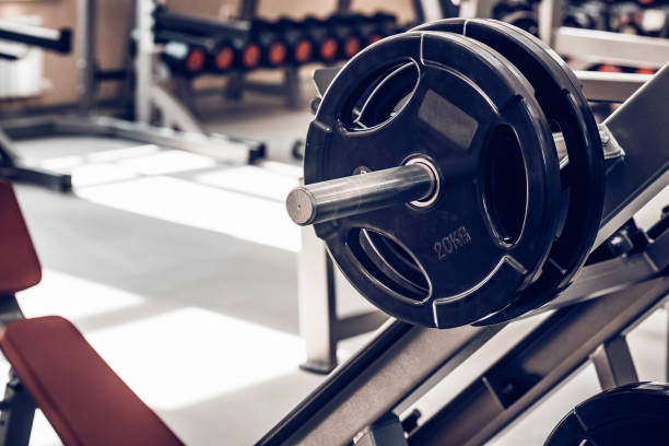 istock Fitness dumbbell and barbell weight plates 928095726
