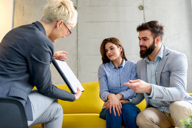 istock Young married couple at their counselor 928095804
