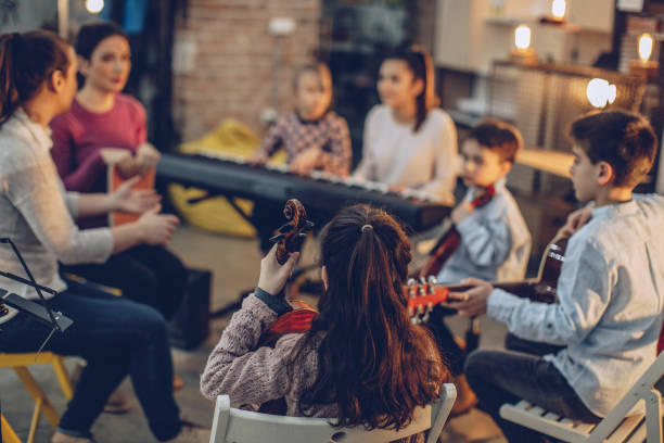 istock Playing music in a youth orchestra 928095834