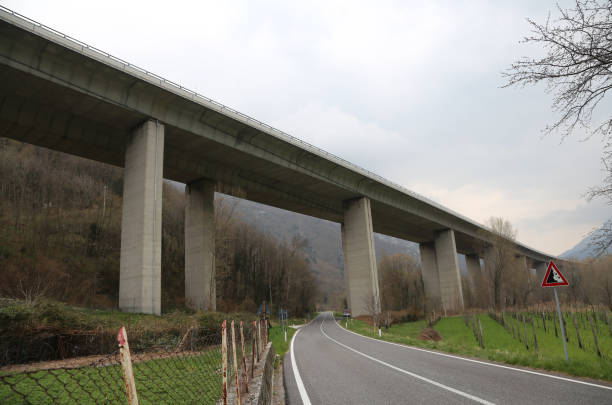 istock very big elevated highway maked with concrete pylons 928096590