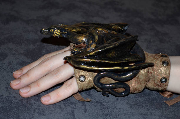 istock Handmade figurine of steampunk dragon, side view 928097216