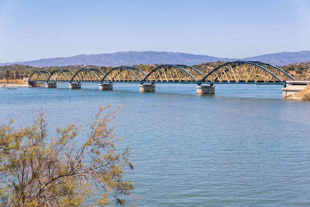 istock Railway bridge over water in portuguese landscape 928100604