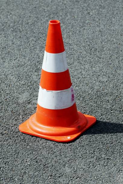 istock High Angle View Of Traffic Cone On Street During Sunny Day 928120170